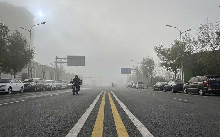 A near-deserted road in Beijing is seen on Nov. 25, 2022.  