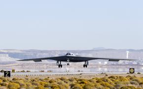 A B-21 Raider conducts flight testing at Edwards Air Force Base, Calif., in September 2024. A second B-21 is expected to be flying by the end of the year, Lt. Gen. Andrew Gebara, the Air Force's deputy chief of staff for strategic deterrence and nuclear integration, said Aug. 27, 2025.
