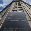 An entrance sign on the Department of Veterans Affairs building, seen from below.