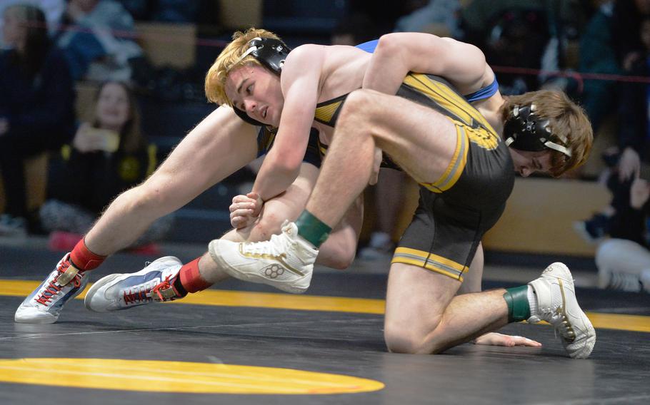 Stuttgart’s Zachary Call took the 144-pound title by defeating Wiesbaden’s Jacob Lane at the DODEA-Europe wrestling championships, in Wiesbaden, Germany, Feb. 11, 2023. 