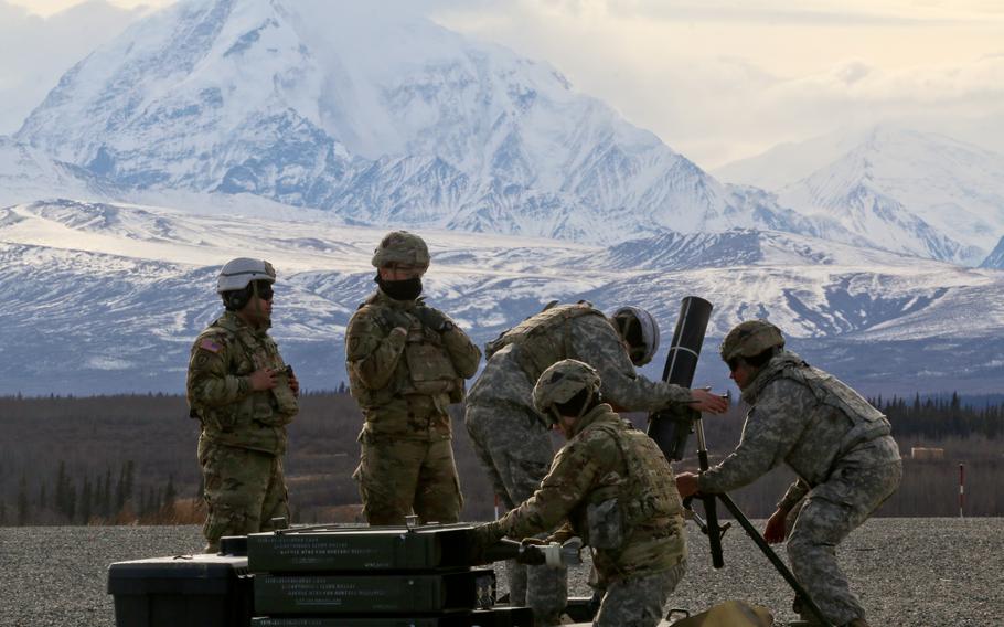 Mortarmen with 4th Infantry Brigade Combat Team (Airborne), 25th Infantry Division, U.S. Army Alaska, prepare to fire their 120mm mortar system during live-fire training exercises March 21, 2019, at Fort Greeley, Alaska. 