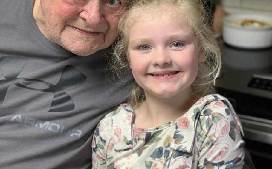 Hody Childress with his great-granddaughter Caroline Nix last year. 