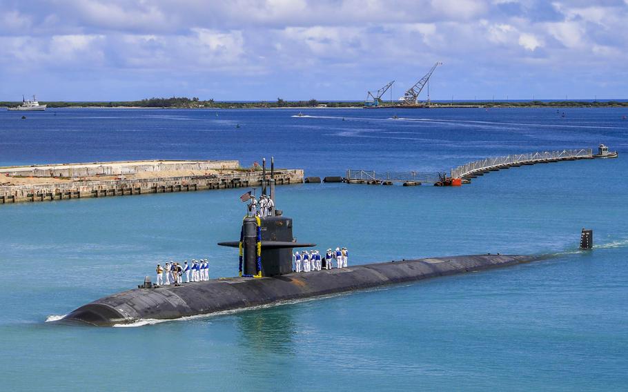 The Los Angeles-class fast attack submarine USS Oklahoma City (SSN 723) returns to U.S. Naval Base in Guam, Aug. 19, 2021. As tensions between France and the United States simmered this week over an Indo-Pacific defense deal that sank a multi-billion-dollar French submarine contract, two French generals quietly passed the baton at the helm of a key NATO command center. 