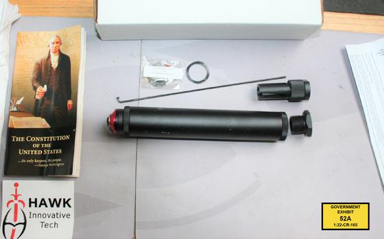 Federal prosecutors say the black metal cylinder sold online by a Georgia company called Hawk Innovative Tech is a silencer "masquerading" as a gun-cleaning device. MUST CREDIT: Evidence photograph from the U.S. Attorney's Office for the Eastern District of Virginia.