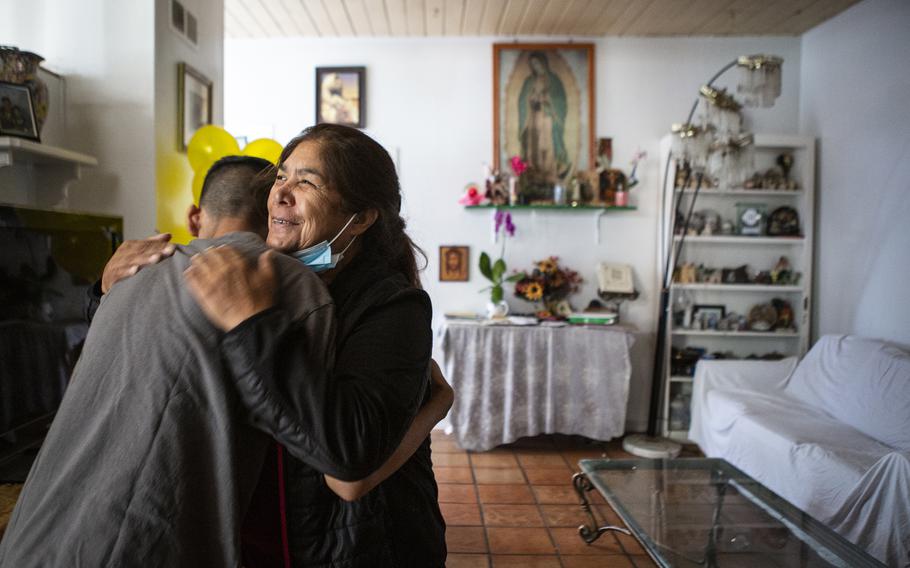 Juana Flores hugs grandson Jarrett, 13, on June 4 on returning to her home in Goleta, Calif., from Mexico two years after being compelled to leave the United States. 
