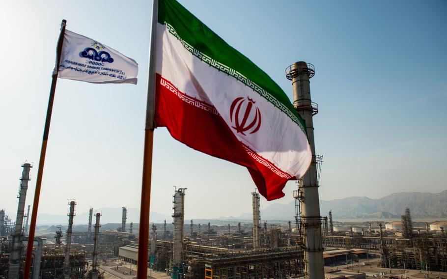 An Iranian national flag flies above the new Phase 3 facility at the Persian Gulf Star Co. (PGSPC) gas condensate refinery in Bandar Abbas, Iran, on Jan. 9, 2019.