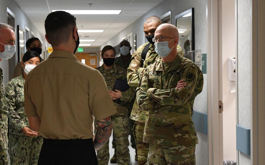 Lt. Gen. Ron Place, right, takes a tour March 22, 2021, at BHC Camp Smith, a clinic for active-duty members at Marine Corps Base Hawaii, Camp Smith. Just over 70% of active-duty troops were fully vaccinated against COVID-19 as of Sept. 8, 2021, two weeks after the vaccine became mandatory for members of the military.