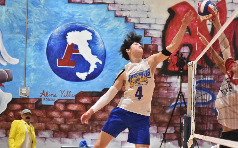 Sigonella's Andrew Martin reaches for the ball Friday, Oct, 28, 2022, in the Jaguars' semifinal loss to American Overseas School of Rome.

Kent Harris/Stars and Stripes