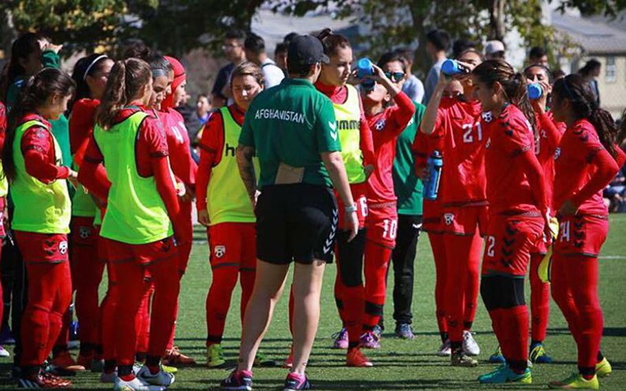 Members of the Afghan women's soccer team at a practice session. Eighty-six players, officials and family members were evacuated from Afghanistan to Australia. 