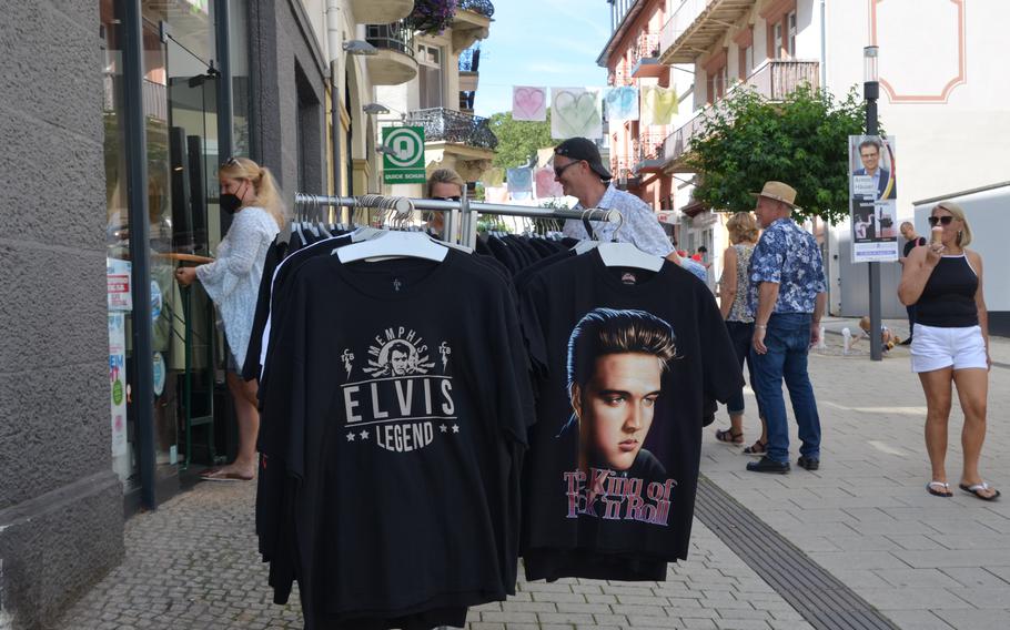 Elvis Presley T-shirts are for sale outside a shop in Bad Nauheim, Germany, August 15, 2021. The spa town hosts the European Elvis Festival in August, in tribute to Presley, who lived in Bad Nauheim from 1958-1960 when he was a private in the U.S. Army. 
