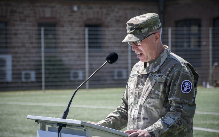 Brig. Gen. Mark Thompson addresses Regional Health Command Europe personnel he commanded for two years at a change of command ceremony in Landstuhl, Germany, June 1, 2022.