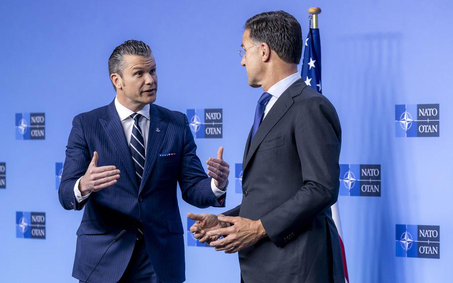 Defense Secretary Pete Hegseth and NATO Secretary General Mark Rutte speak.