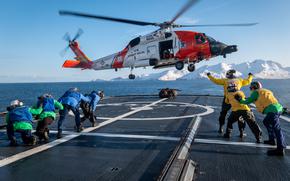 Crew members from Coast Guard Cutter Alex Haley conducting helicopter operations with a Coast Guard Air Station Kodiak MH-60 Jayhawk helicopter aircrew in the Bering Sea, January 8, 2024.



 U.S. Coast Guard photo by Coast Guard Cutter Alex Haley crewmembers