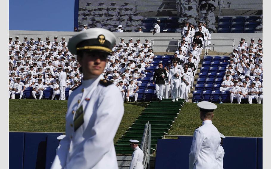 Naval Academy graduates file into the Navy-Marine Corps Memorial Stadium for their graduation ceremony on May 26, 2023. A leadership transition at the academy has been held up because Sen. Tommy Tuberville, R-Ala., objects to a military policy on abortion access.
