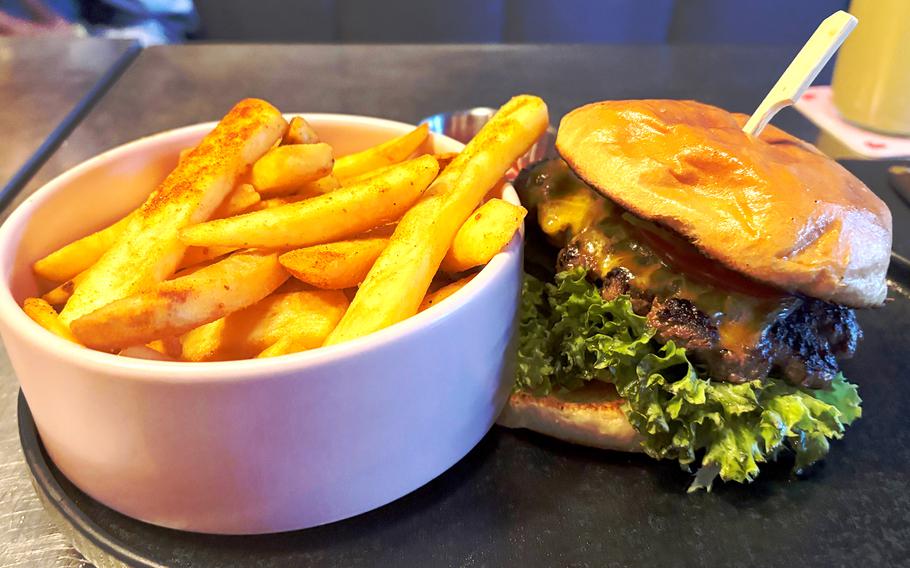 A cheeseburger with fries.