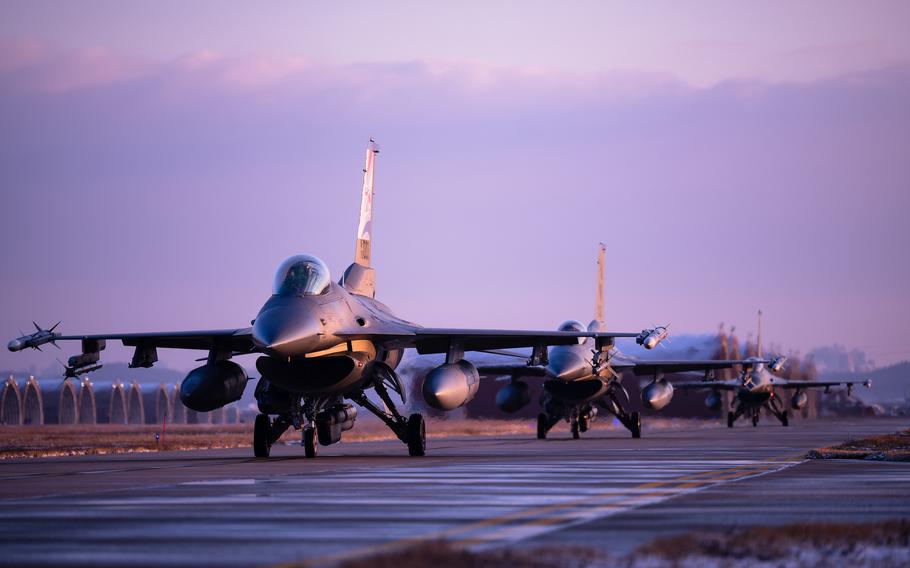 F-16 Fighting Falcons assigned to the 80th and 35th Fighter Squadrons taxi before take-off at Kunsan Air Base, South Korea, Dec. 1, 2023. 