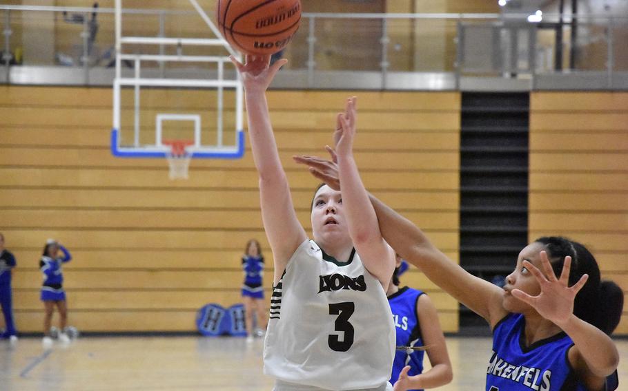 AFNORTH’s Isabella Guest shoots against Hohenfels in the Lions’ pool play victory Thursday, Feb. 15, 2024, at the DODEA European Division III Basketball Championships in Wiesbaden, Germany.