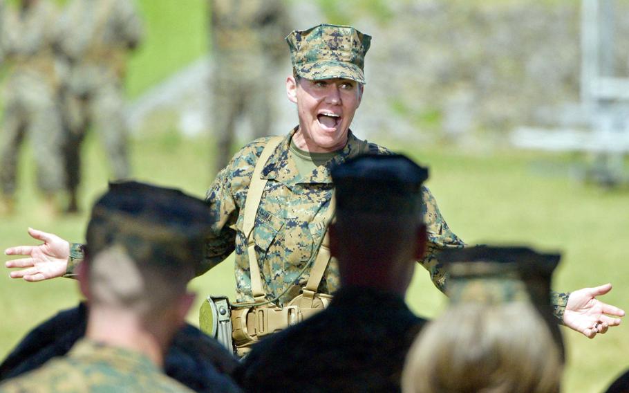 Marine Sgt. Maj. Joy Kitashima, the III Marine Expeditionary Force's new sergeant major, speaks during a relief-and-appointment ceremony at Camp Courtney, Okinawa, March 7, 2023.