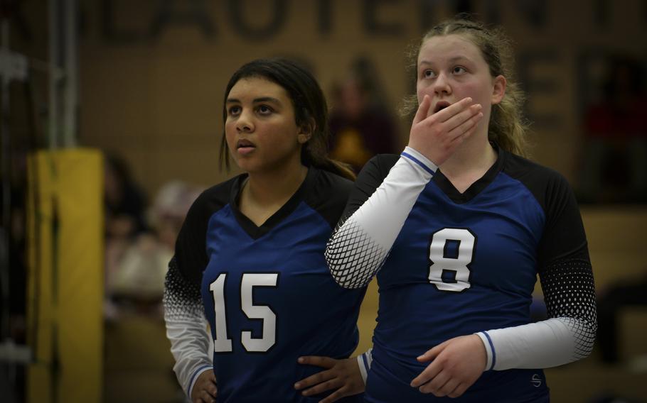 During the tense final minutes of a closely contested match, Brussels Brigand Taegan Muller, on the right, and Sonia Desir anxiously await the referee’s call on a pivotal play against the Sigonella Jaguars at the DODEA Division III European volleyball semifinals on Oct. 27, 2023, in Kaiserslautern, Germany.