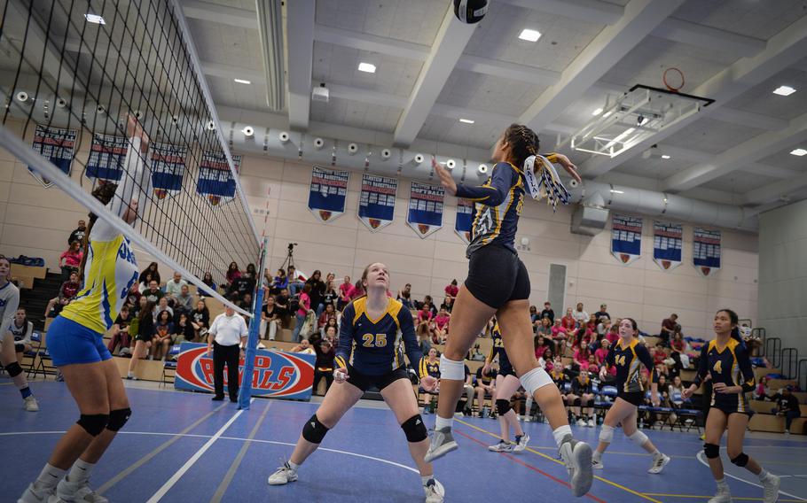 Laila McIntyre spikes the ball across to Sigonella during the final Division III championship match at the 2022 DODEA-Europe Volleyball Tournament Oct. 29, 2022, at Ramstein Air Base, Germany.