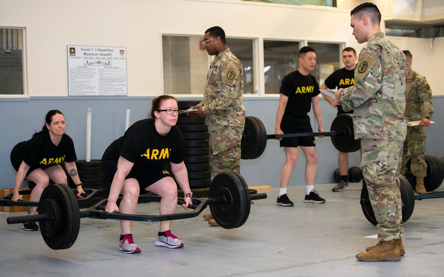 Soldiers perform the deadlift under the observation of graders as part of their participation in a diagnostic Army Combat Fitness Test, held April 13, 2020, at Aberdeen Proving Ground, Md.