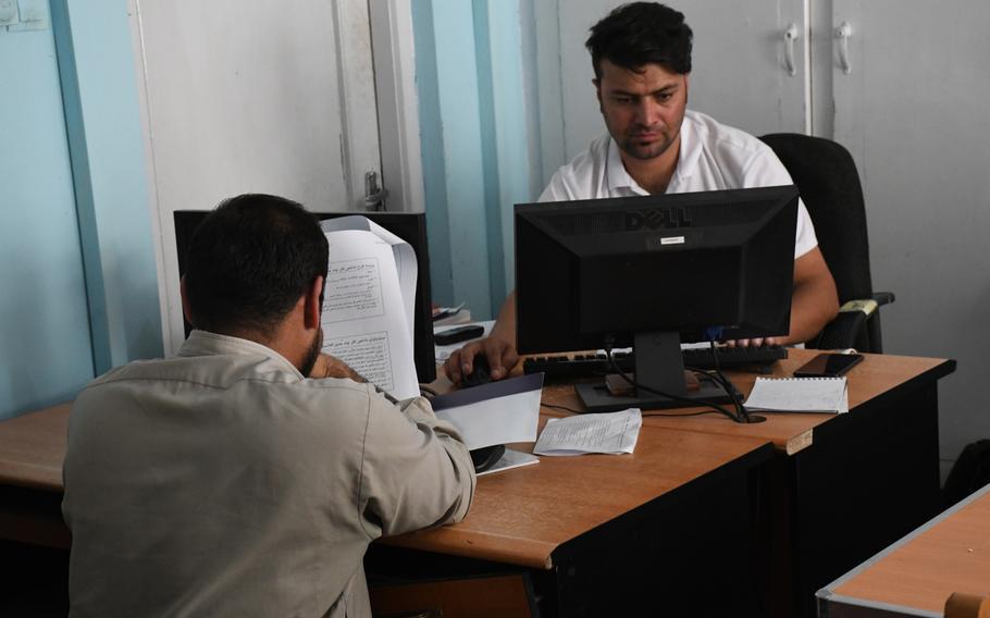 Journalists work in the newsroom of Pajhwok news agency on Sept. 4, 2019. Many Afghan reporters from across the country have taken refuge in Kabul from Taliban offensives following the withdrawal of most U.S. and coalition troops.