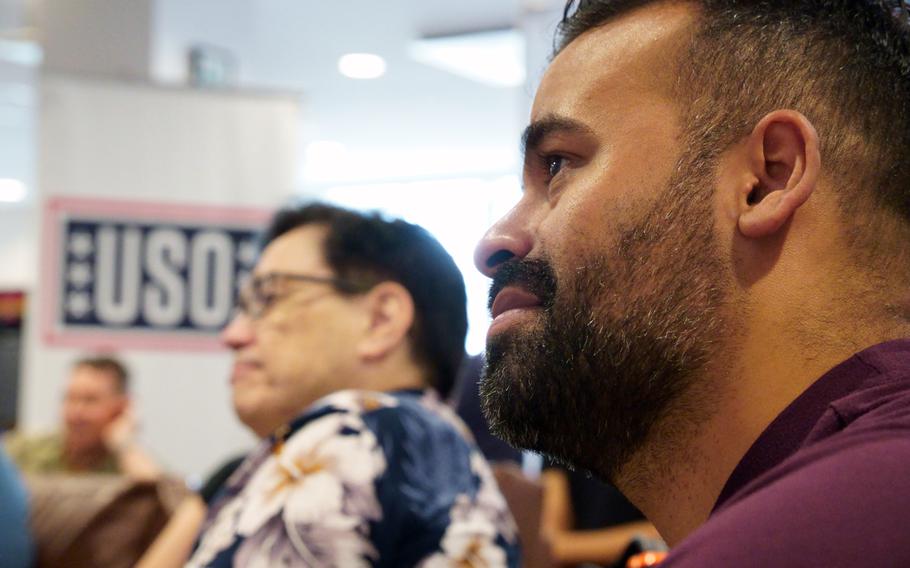 Service members and veterans take part in a virtual meetup with the stars of “The Covenant,” Jake Gyllenhaal and Dar Salim, at the USO on Yokosuka Naval Base, Japan, Friday, April 21, 2023.