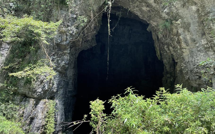 An entrance to the Tenglong Cave system in Enshi prefecture in China's Hubei province. Tourists are not allowed to enter through this entrance, though local villagers can access the caves here to pump out water. Just a mile away is Changyan Farm, which was licensed to raise civets and porcupine before the pandemic. 