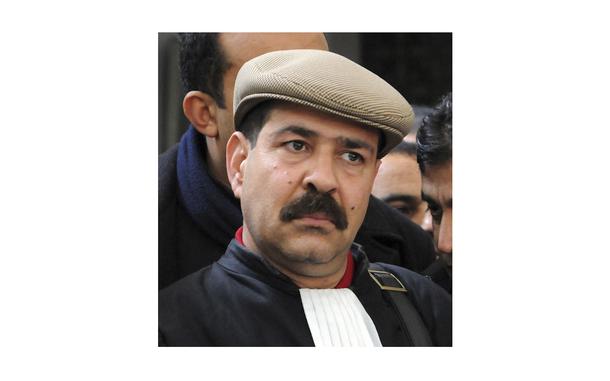 Tunisian lawyer Chokri Belaid attends a briefing in Tunis on Dec. 29, 2010. Belain was assassinated in 2013. On Wednesday, March 27, 2024, four people were sentenced to death and two given life imprisonment for their roles in the assassination.