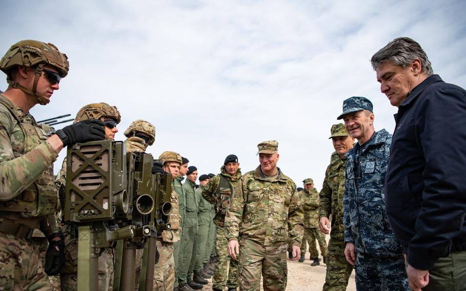 U.S. Army paratroopers assigned to the 173rd Airborne Brigade speak with Croatian President Zoran Milanovic after firing FIM-92 Stingers during an air defense exercise. This training was part of exercise Operation Shield near Pula, Croatia, on April 9, 2022.