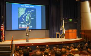 NEWPORT, R.I.— Dr. Toshi Yoshihara, a senior fellow at the Center for Strategic and Budgetary Assessments, delivers keynote remarks on international strategy with regard to Taiwan and the People’s Republic of China during the 74th Current Strategy Forum (CSF) at the U.S. Naval War College (NWC) onboard Naval Station Newport, June 10, 2025. This year’s CSF, titled “The Future of Sea Power, Maritime Strategy and Naval Warfare,” brought senior military leaders, national security scholars and researchers, foreign and defense policy practitioners and NWC students and faculty together to examine the international balance of power and the role of sea power in strategic competition moving forward. Established in 1884, NWC informs today’s decision-makers and educates tomorrow’s leaders by providing educational experiences and learning opportunities that develop their ability to anticipate and prepare strategically for the future, strengthen the foundations of peace, and create a decisive warfighting advantage. (U.S. Navy photo by Mass Communication Specialist 2nd Class Connor Burns)