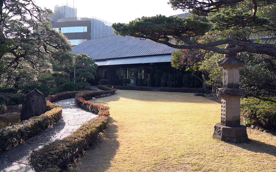 A long walkway to the entrance of Nezu Museum takes visitors from Tokyo's busy streets to the world of pre-modern Japanese and East Asian art.
