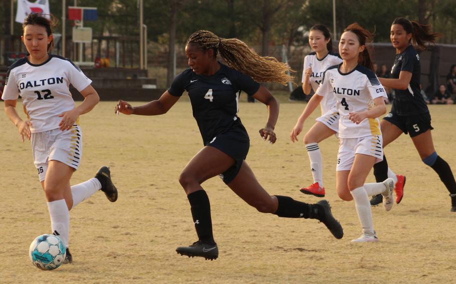 Osan's Tatiana Lunn dribbles against Cheongna Dalton during Wednesday's Korea girls soccer match. The teams played to a 0-0 draw.