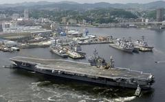 The aircraft carrier USS Kitty Hawk departs Yokosuka Naval Base, Japan, for the final time, May 28, 2008.