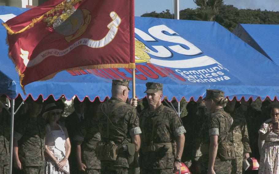 Maj. Gen. Stephen Liszewski, center, assumes command of Marine Corps Installations Pacific from outgoing Maj. Gen. William Bowers, left, at Camp Foster, Okinawa, Japan, on June 24, 2022. 