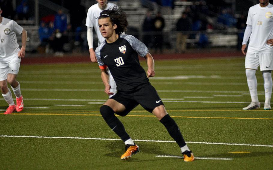 Stuttgart senior Itzak Sandoval watches his penalty go into the back of the net during a match against Ramstein on April 27, 2024, at Stuttgart High School in Böblingen, Gemany.
