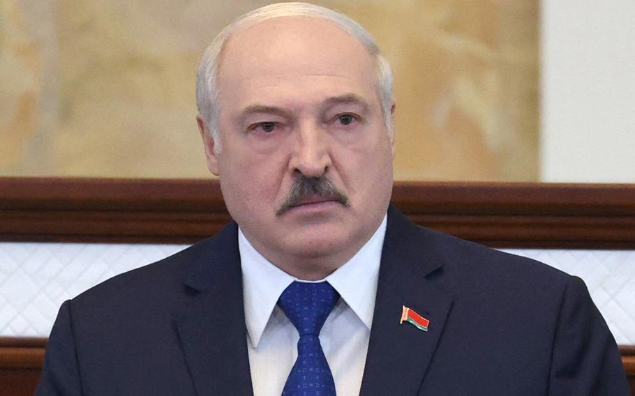 Belarusian President Alexander Lukashenko attends a meeting in Minsk on May 26, 2021. Lukashenko on Friday, Nov. 26, gave the green light to migrants on the Polish border to cross over if they so desire. 