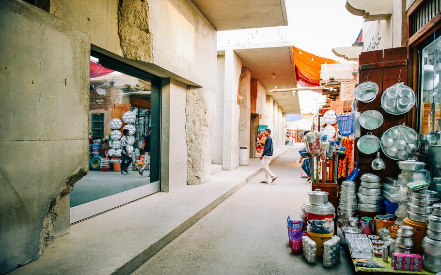 The souk in Muharraq, Bahrain, still maintains many of its traditional facades but has been updated with modern construction as part of the country’s architectural revitalization efforts. The richly textured facade of storefronts feels both futuristic and traditional.