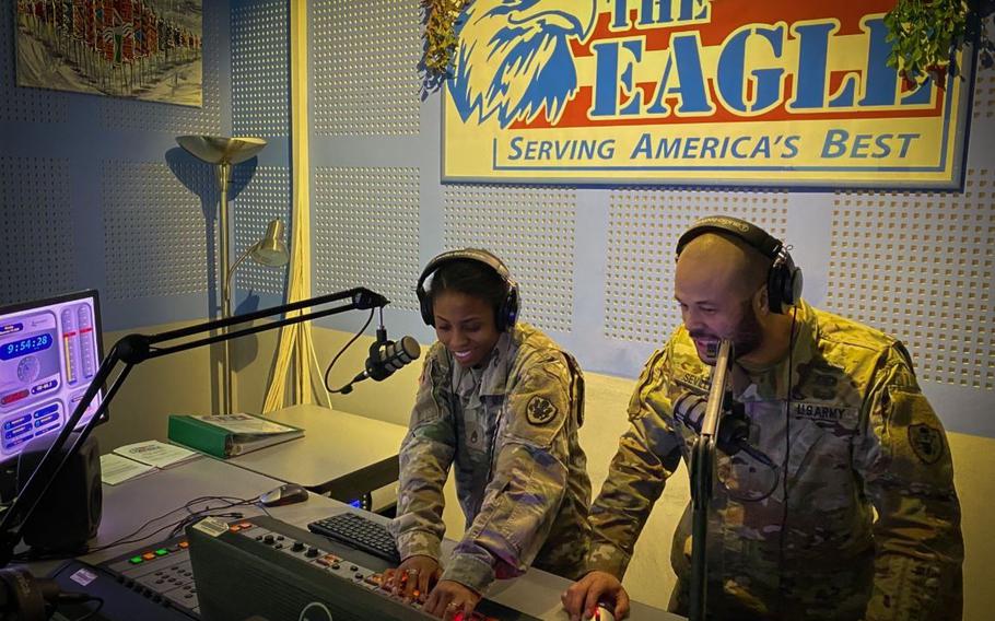 Staff Sgt. Sharifa Newton and Staff Sgt. Page Sevilla work the board at AFN Vicenza at Caserma Ederle, Italy, during a recent morning show. Their broadcasts are now heard at 105.3 FM and on the AFN Go app.