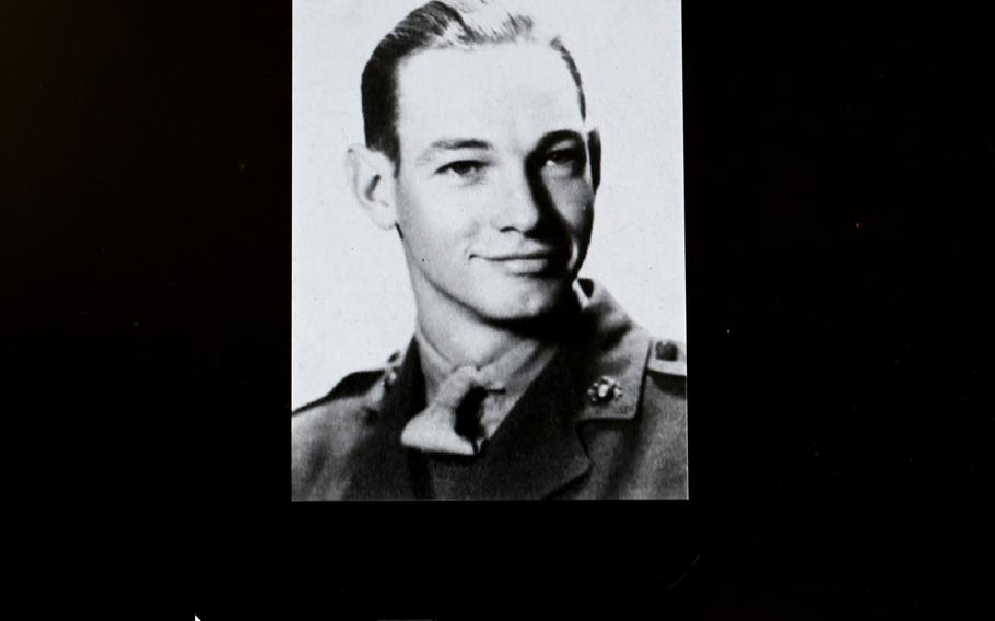 A photograph of Marine Clarence Hodgson of Iowa is viewed on a computer monitor at the National Museum of the Marine Corps. 