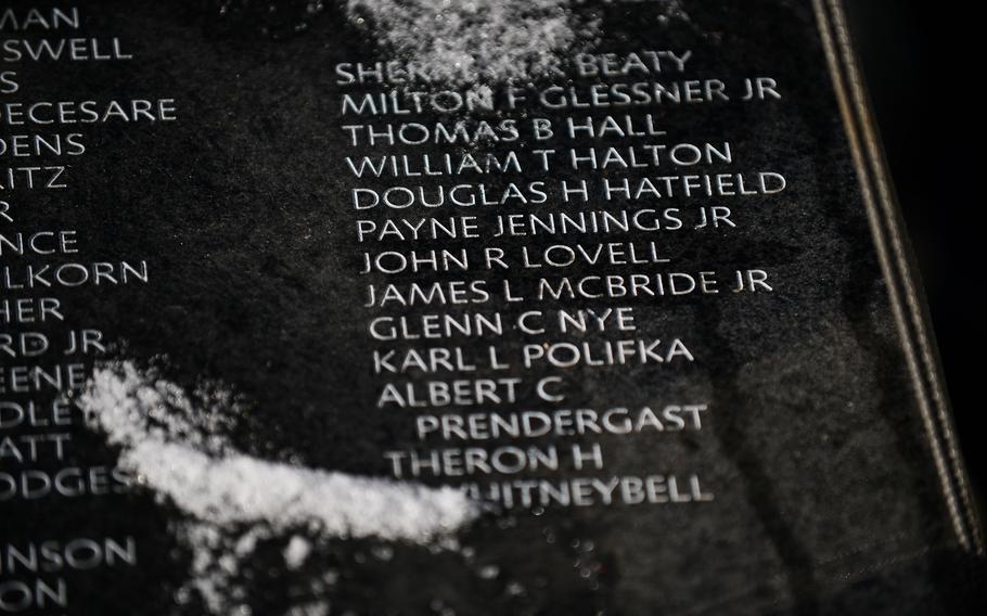 The first seven-ton panel with 450 names was placed at the Korean War Memorial early Monday. Col. John R. Lovell’s grandson was there to watch. 