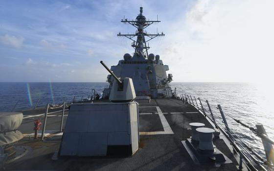 The guided-missile destroyer USS Halsey steams through in the South China Sea, May 10, 2024.