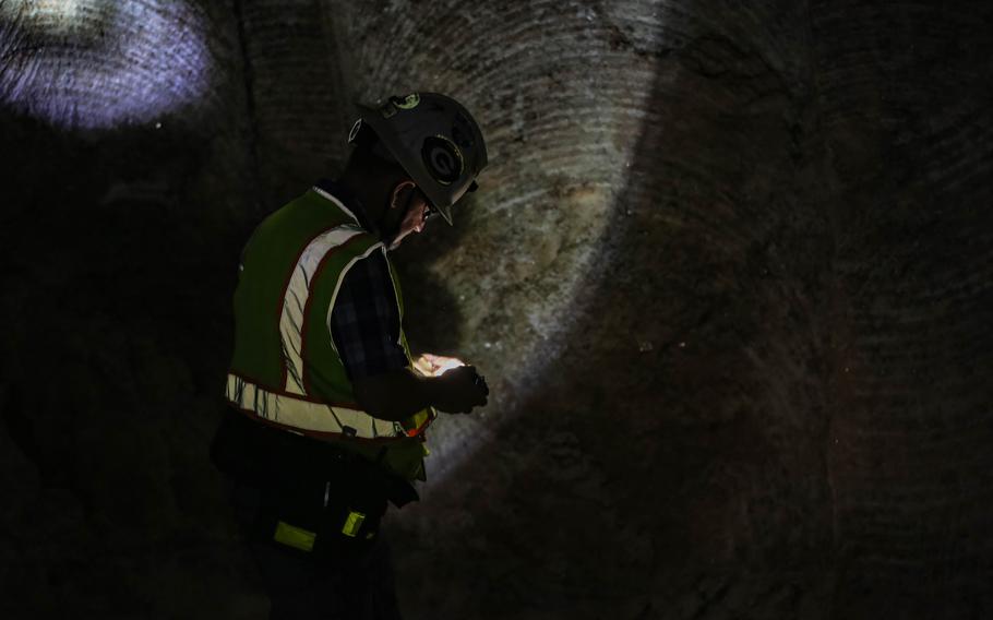 Bobby St John looks at salt in a geological repository, U.S. Department of Energy’s Waste Isolation Pilot Plant, storing transuranic radioactive waste in the desert between Hobbs and Carlsbad on Aug. 17, 2021