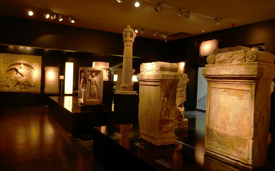 Inside the room dedicated to Romans religions at the Roemermuseum in Osterburken, Germany. The carved stones at right are Roman consecration altars. A person had an altar made and was then considered to be under the protection of the deities to whom the altar was consecrated.