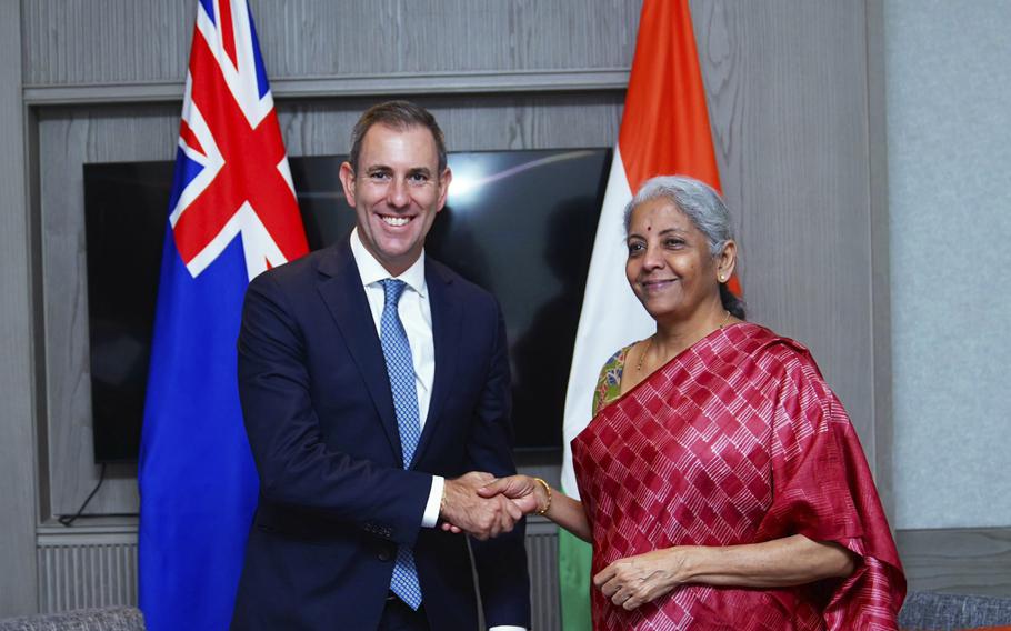In this handout photo released by Indian Finance Ministry, Australia’s Treasurer Jim Chalmers, left, meets with Indian Finance Minister Nirmala Sitharaman on the sidelines of G-20 financial conclave on the outskirts of Bengaluru, India, Saturday, Feb. 25, 2023. 