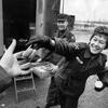 Hed: Donuts, coffee and a bit of quip, 1959

Somewhere in South Korea, April 1959: Judy Haag, one of some 50 Red Cross women operating the organization's Clubmobiles across South Korea, hands out donuts to a servicemember. 
Haag, who hails from Greendale, Wis. and admitted that before joining the Red Cross she never travelled farther than Minnesota, now travels to some five different military outfits a day, be it in truck, or by helicopter. 

Dubbed "Doughnut Dollies" during the Korean War, the Red Cross Clubmobiles and the women who operate them date back to World War II when teams of three female Red Cross workers travelled to troops stationed in Great Britain and Europe in busses equipped with a stove for coffee and a built-in donut maker, carrying magazines, candy, playing records, and a friendly chat to U.S. troops. 

From Stars and Stripes' decades worth of articles on the women who signed up for "hard work in less than ideal conditions," it's clear that they, not the donuts, were the real morale boosters. 

Read the original 1959 article on Judy and her Red Cross pals here. 

META DATA: Pacific; South Korea; ASCOM; Army Service Command; Red Cross; women in the military; Donut Dollies; Doughnut Dollies; military life; Clubmobile program