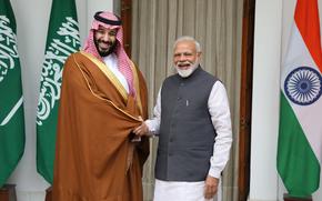 Mohammed Bin Salman, Saudi Arabia's crown prince, left, shakes hands with Narendra Modi, India's prime minister, at Hyderabad House in New Delhi on Feb. 20, 2019. MUST CREDIT: Bloomberg photo by T. Narayan.