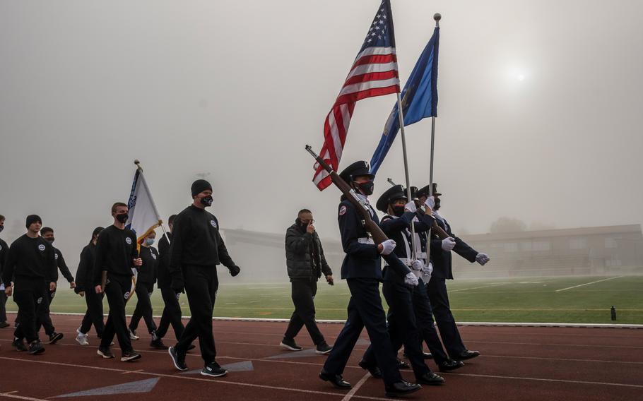 Members of the Air Force Junior Reserve Officer Training Corps at Kaiserslautern High School lead a Veterans Day march Thursday, Nov. 11, 2021. 