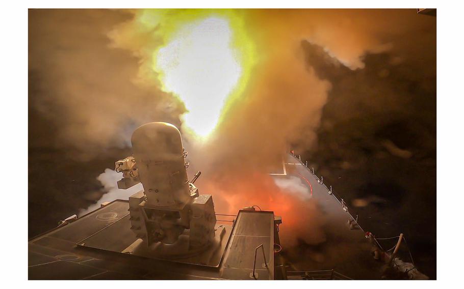 The Arleigh Burke-class guided-missile destroyer USS Carney (DDG 64) shoots at a combination of Houthi missiles and unmanned aerial vehicles in the Red Sea, on Oct. 19, 2023. 