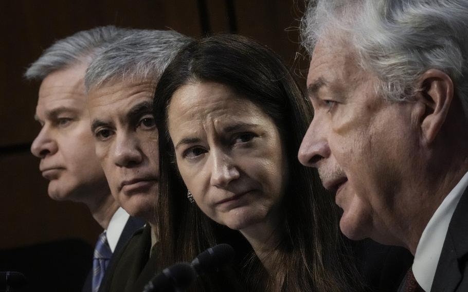 From left to right, FBI Director Christopher Wray; Director of the National Security Agency Gen. Paul Nakasone; Director of National Intelligence Avril Haines; and CIA Director William Burns testify March 8 during a Senate Intelligence Committee hearing concerning worldwide threats, including China, the origins of COVID-19 and TikTok.